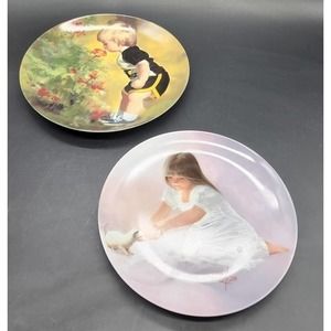 2 Pemberton and Oakes collector plates "Tender Beginning" and "Grandma's Garden"